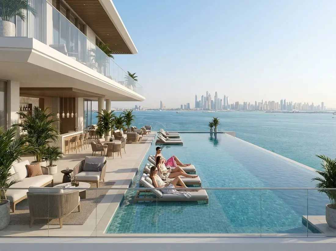 Basen infinity i dachowy sky lounge z widokiem na morze w Elle Residences