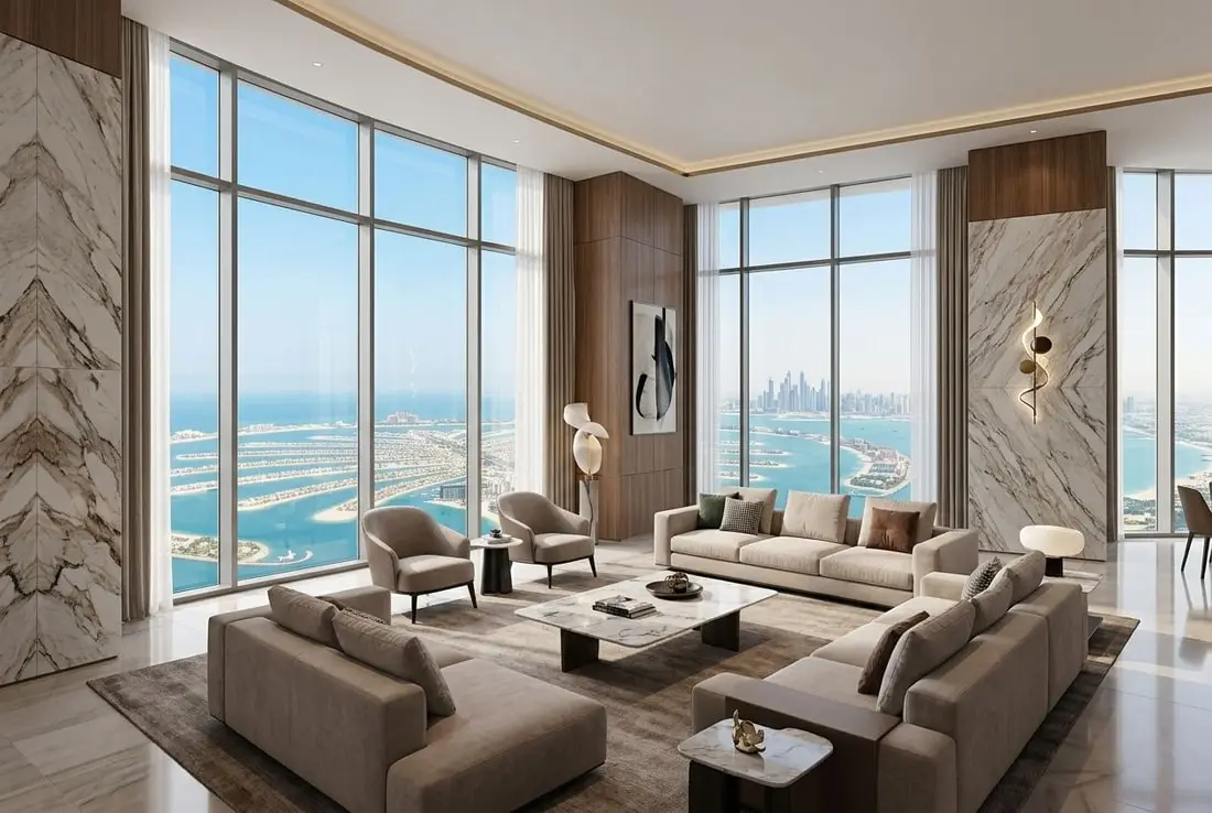 Ultra-luksusowy salon apartamentu z wykończeniami z drewna i marmuru oraz panoramą Palm Jumeirah